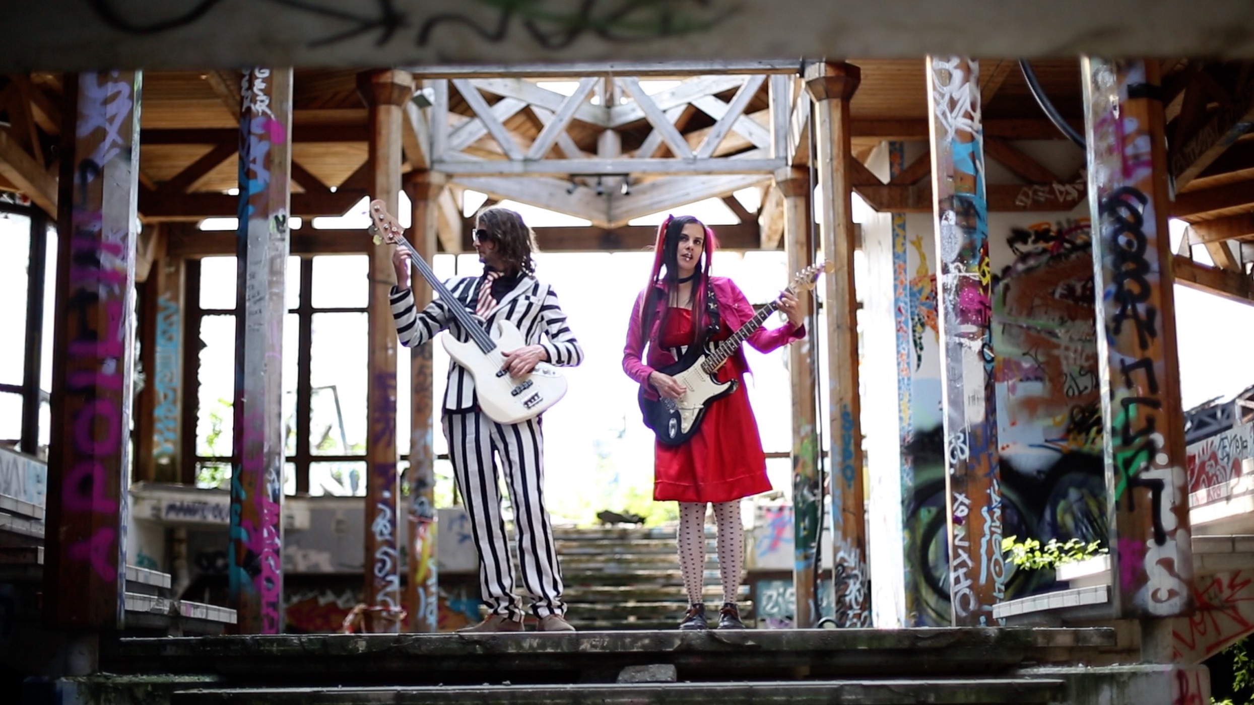 A picture of the band playing in an abandoned and derelict location in Berlin